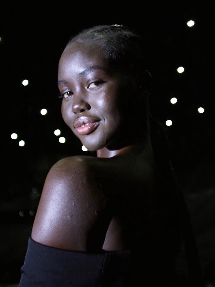 Adut Akech in a moody night portrait for the Coperni la nuit shoot