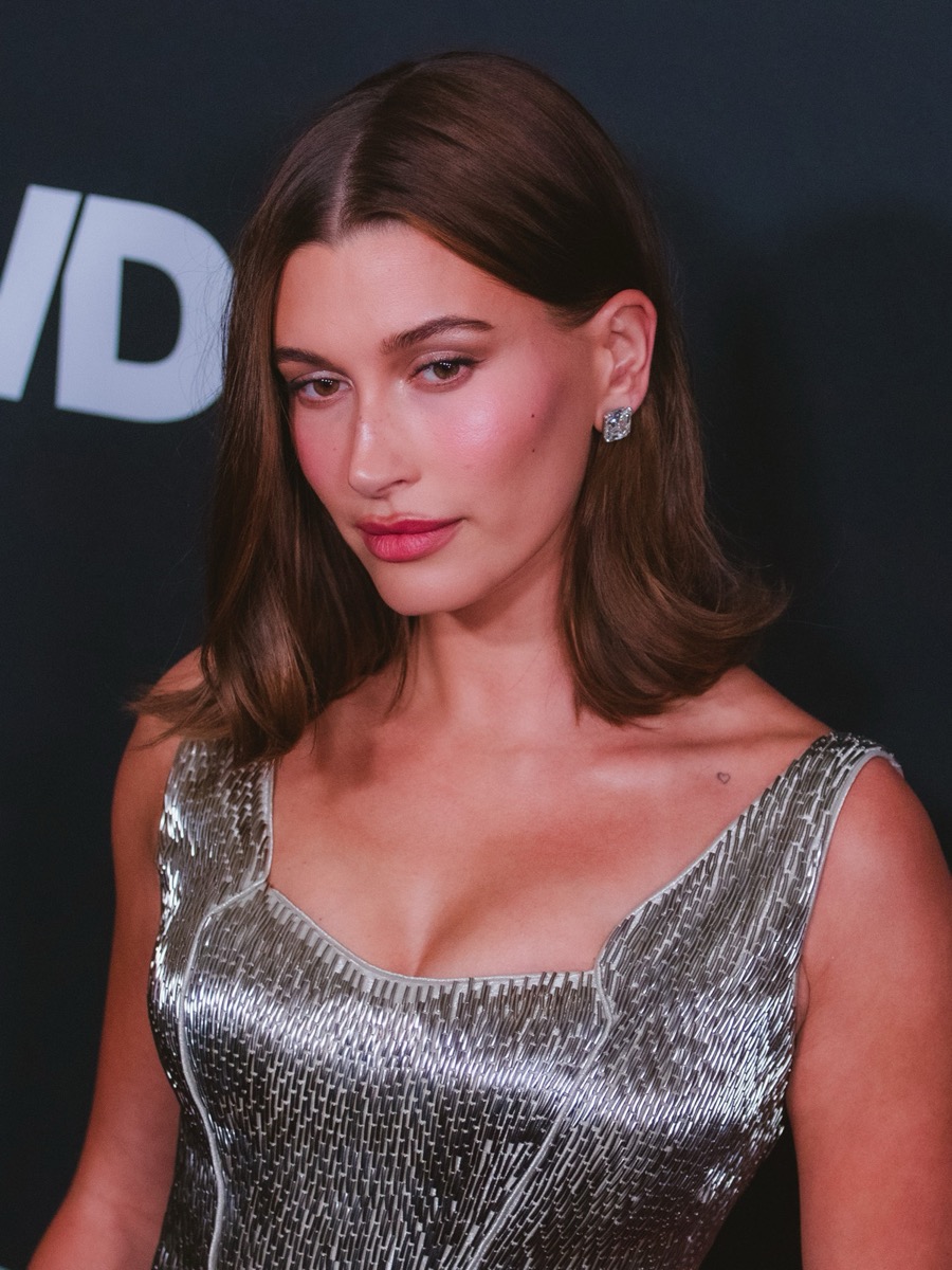 Hailey Bieber in a silver beaded dress at the WWD Style Awards, 2026