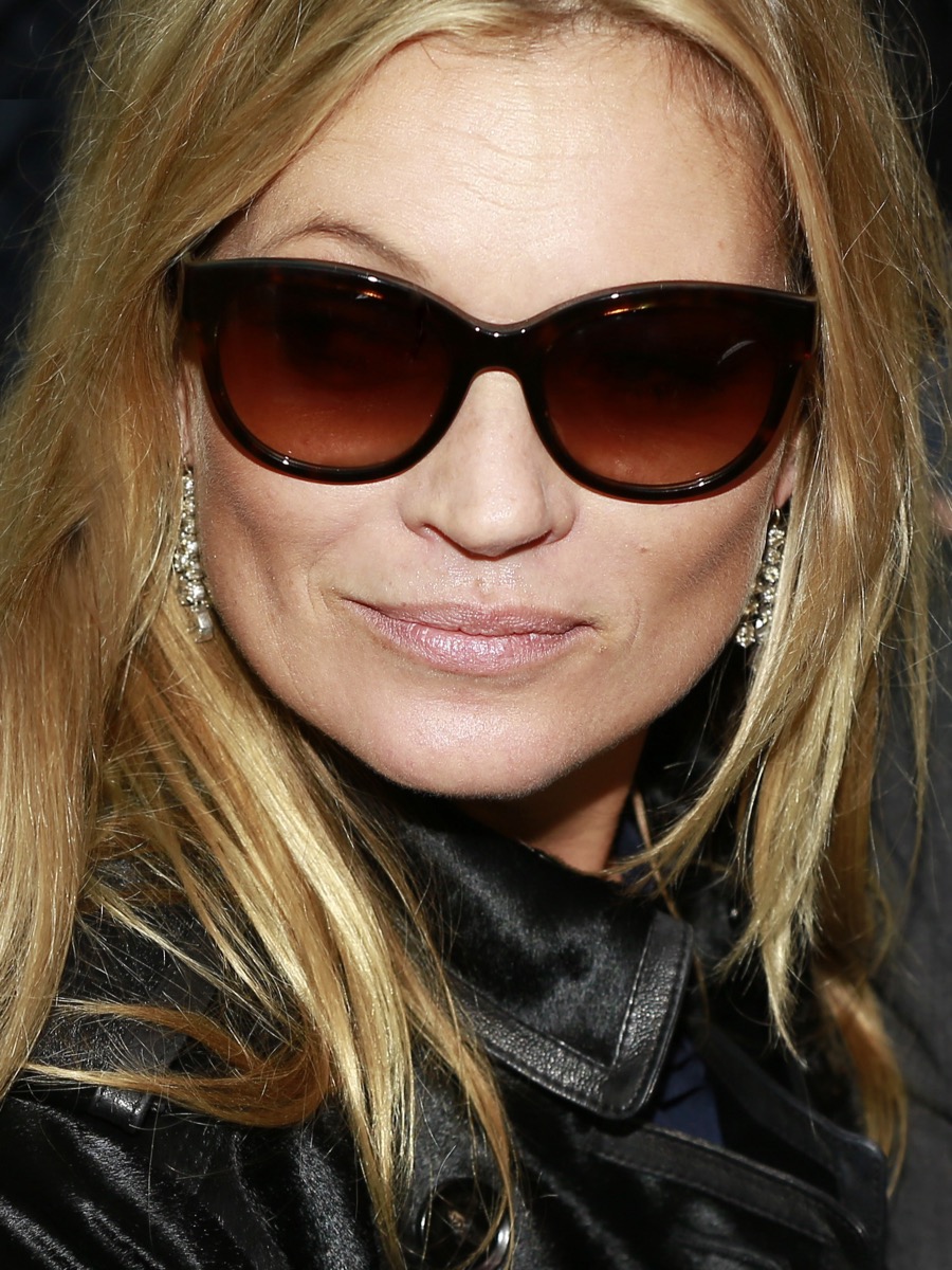 Kate Moss in tortoiseshell sunglasses and a black leather jacket