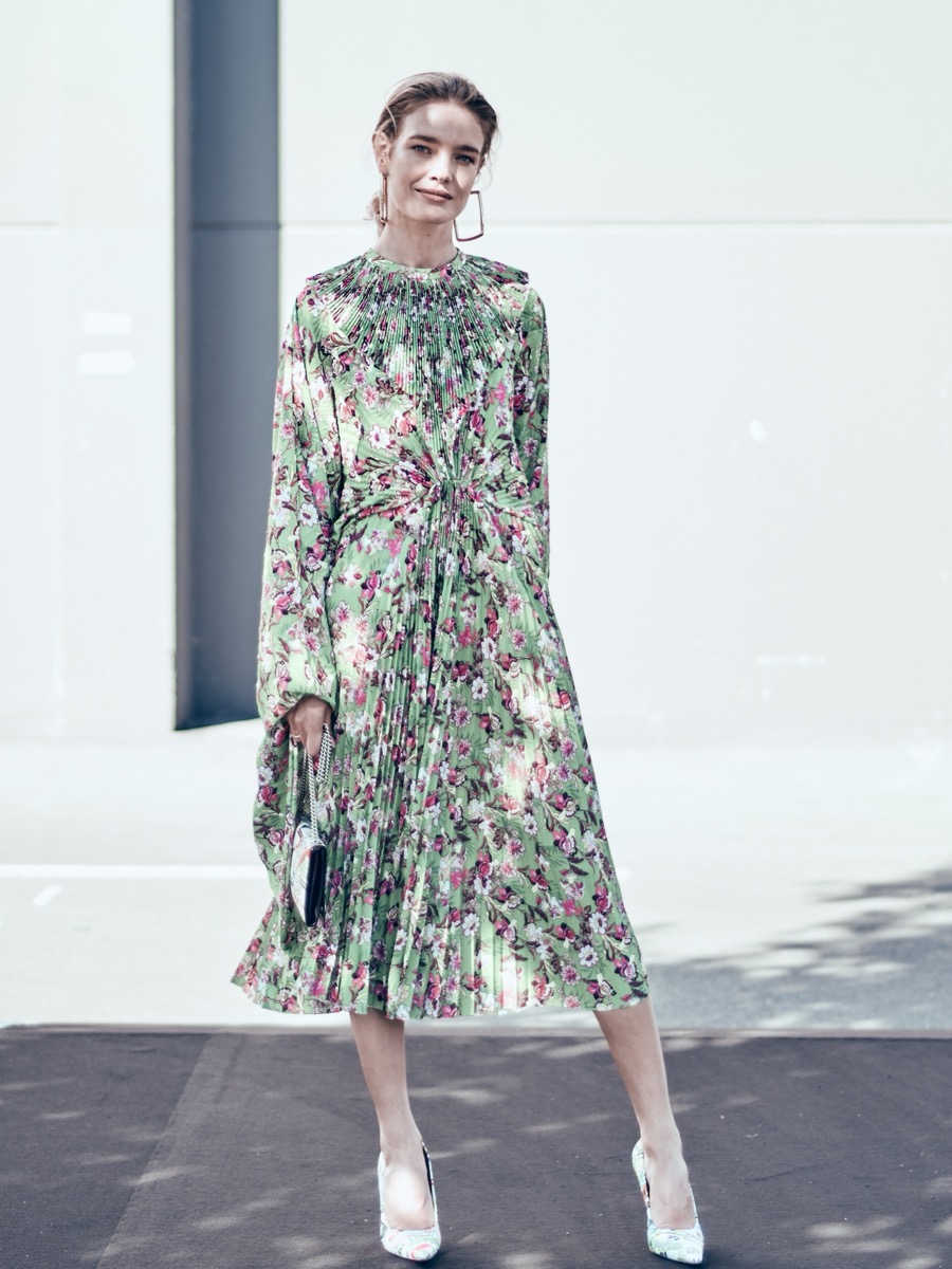Natalia Vodianova in a green floral pleated dress at Paris Fashion Week, Spring/Summer 2019
