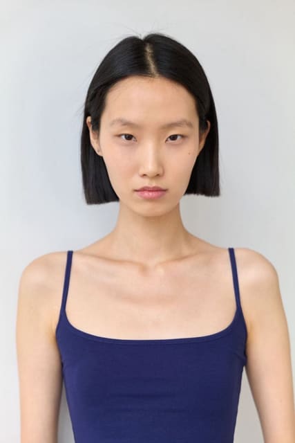 Mingyi Tang