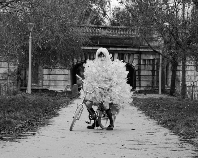 Cycling Through Paris — L'Officiel Italia